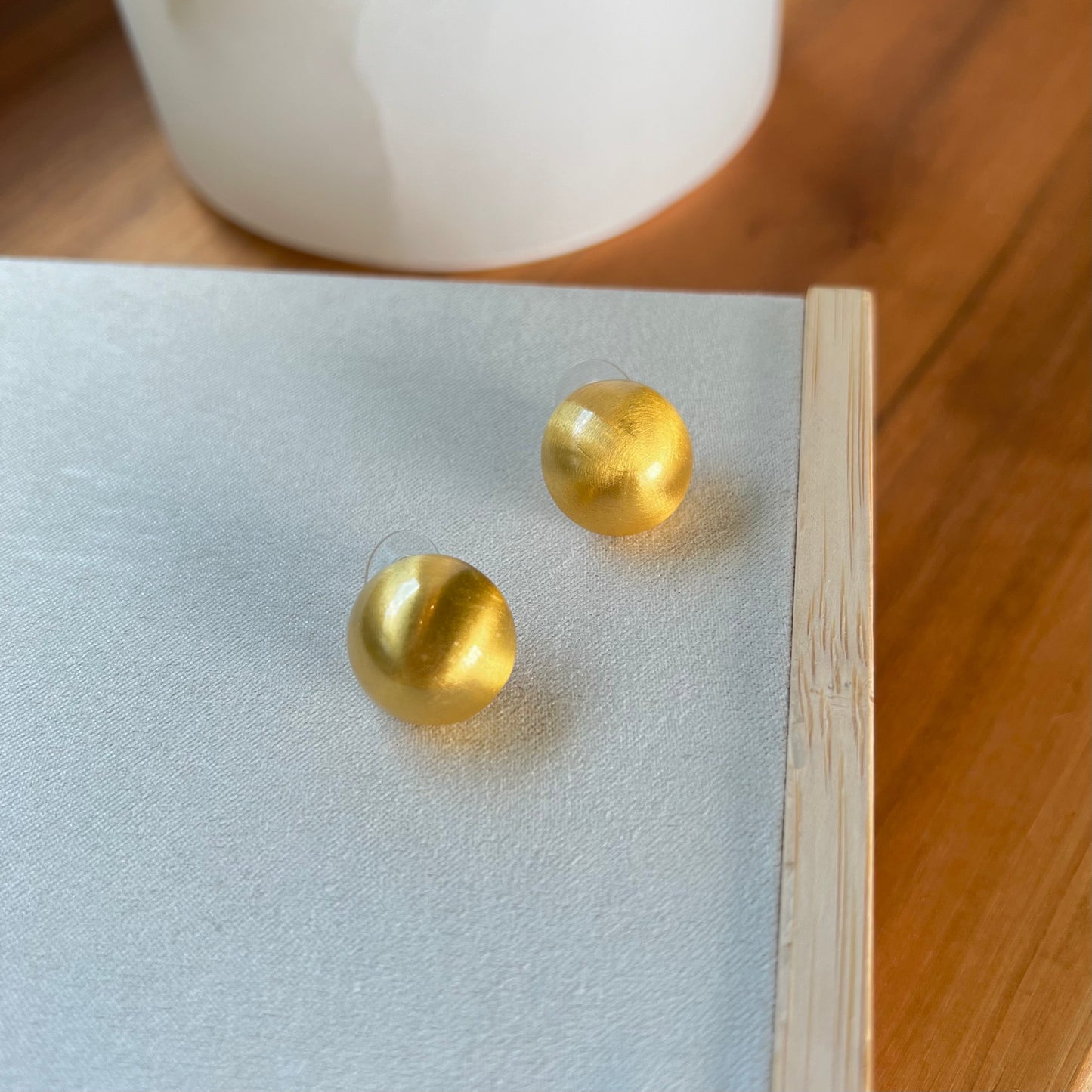 Golden round earrings