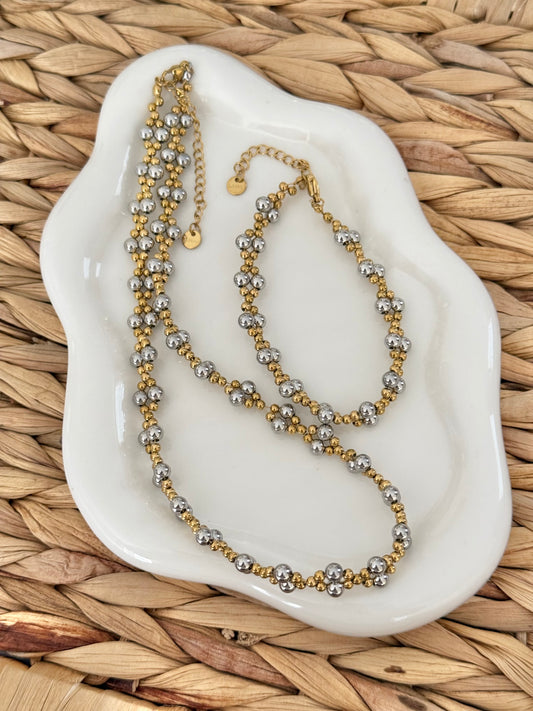 Silver beads with gold set