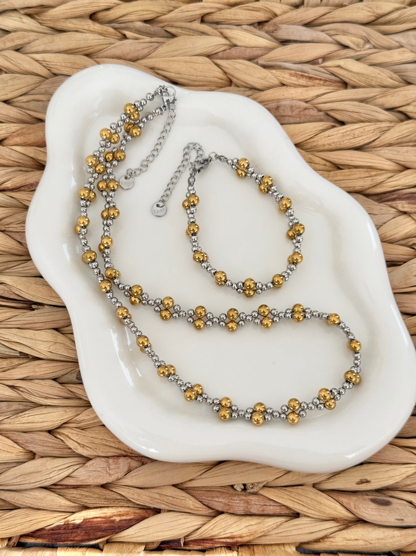 Gold beads with silver set