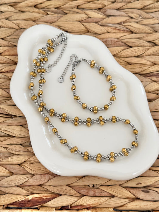 Gold beads with silver set