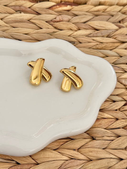 X gold earrings